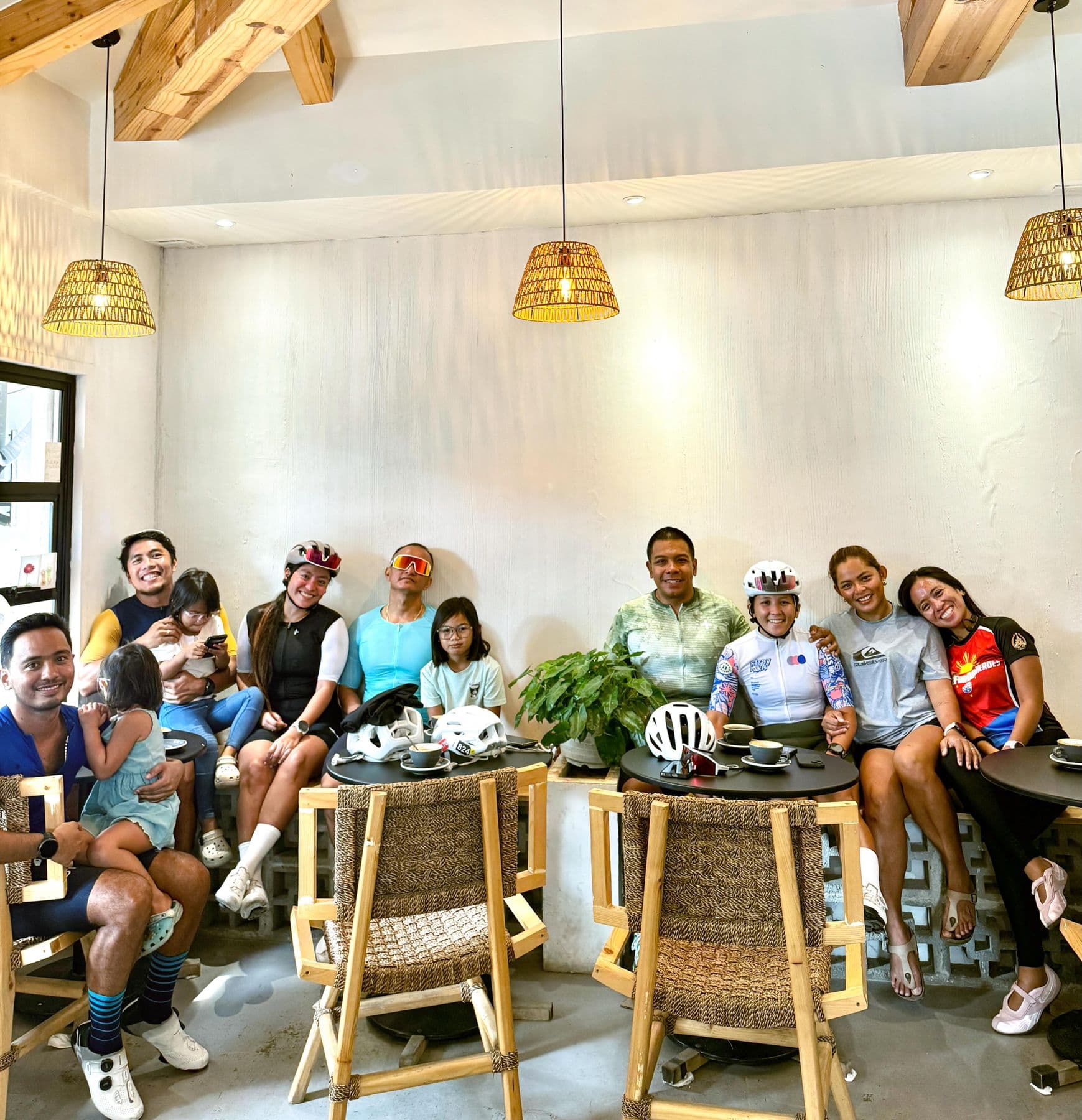Athletes and friends relaxing together at a café